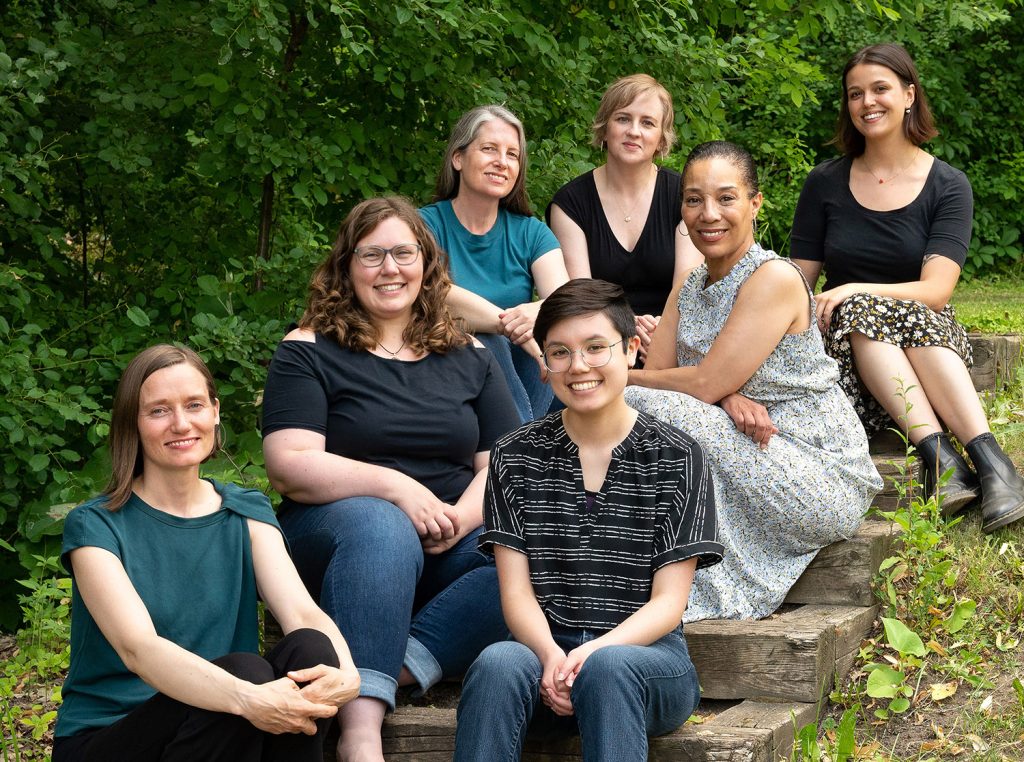 Employees of Background Stories in an exterior shot