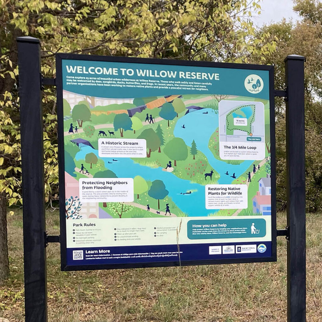 Colorful sign at the entrance of Willow Reserve created for Capitol Region Watershed District