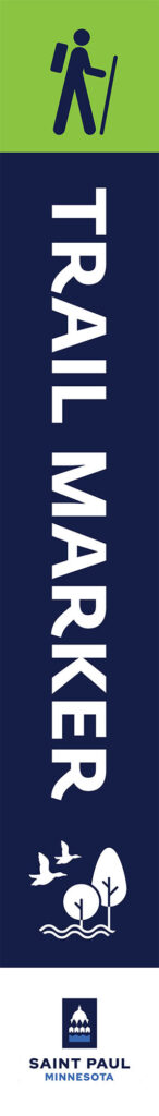 Vertical trail marker with hiking imagery